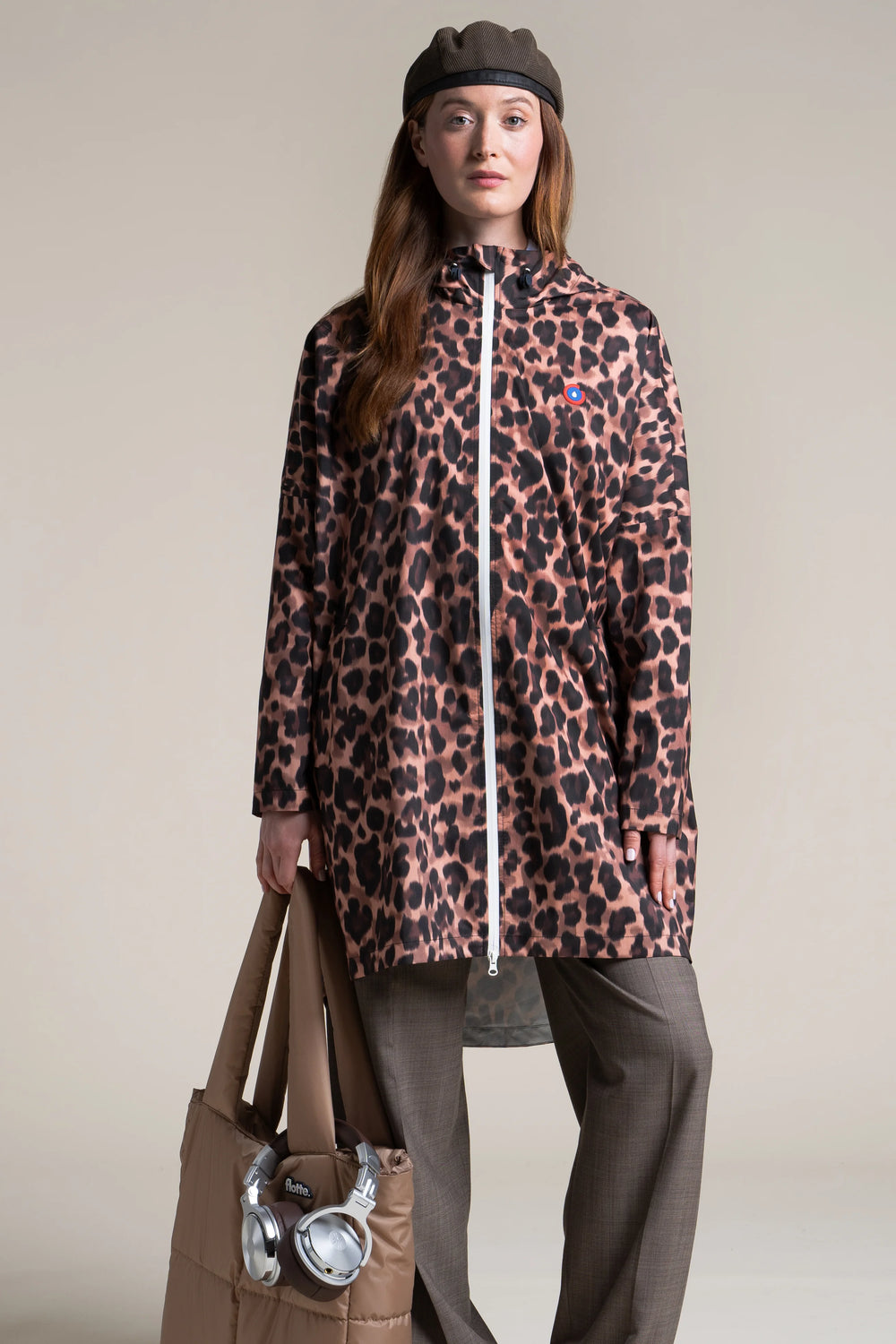 Liberté - Cape de pluie - Veste coupe-vent modulable en sac - Flotte - couleur new leopard #couleur_new-leopard